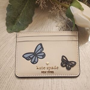 Kate Spade Cream Card Holder with Blue Butterfly Design